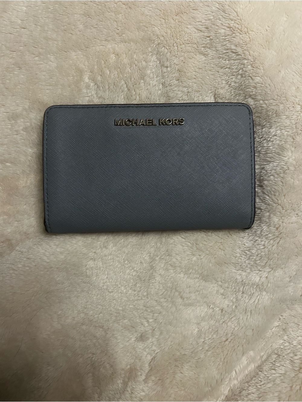 Blue Michael Kors wallet